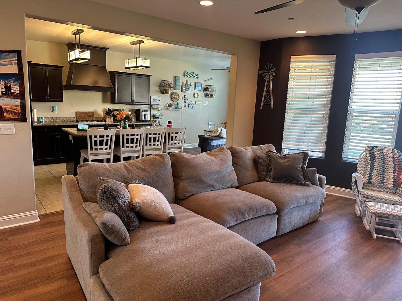 Open-concept view from family room into kitchen