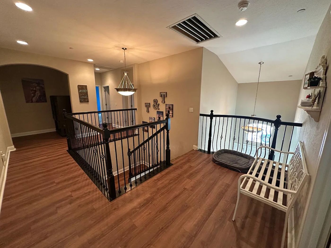 Upstairs loft landing with iron railings